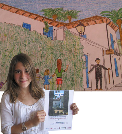 Ana Ruiz, del CEIP San Francisco (Cájar) junto a su dibujo 